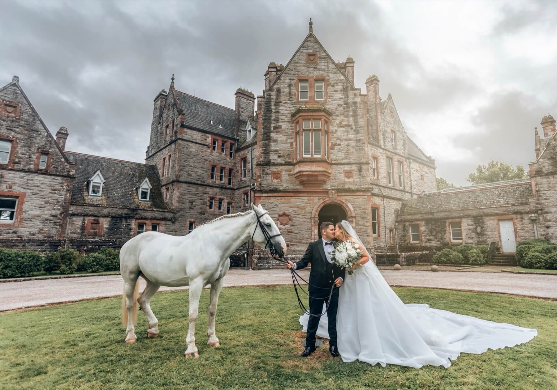 Couple with a horse at Castle Leslie