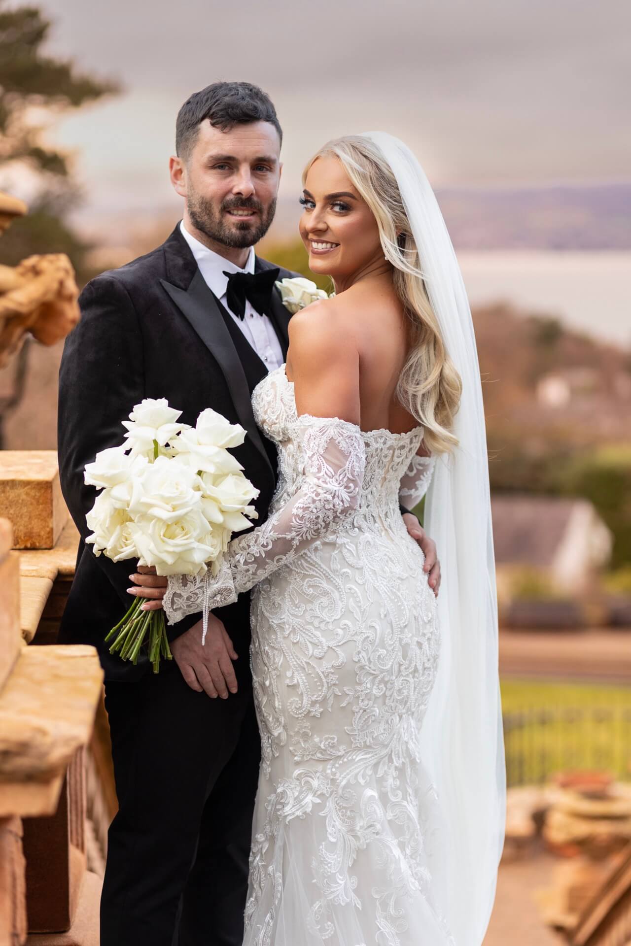 Wedding couple on terrace Culloden Estate
