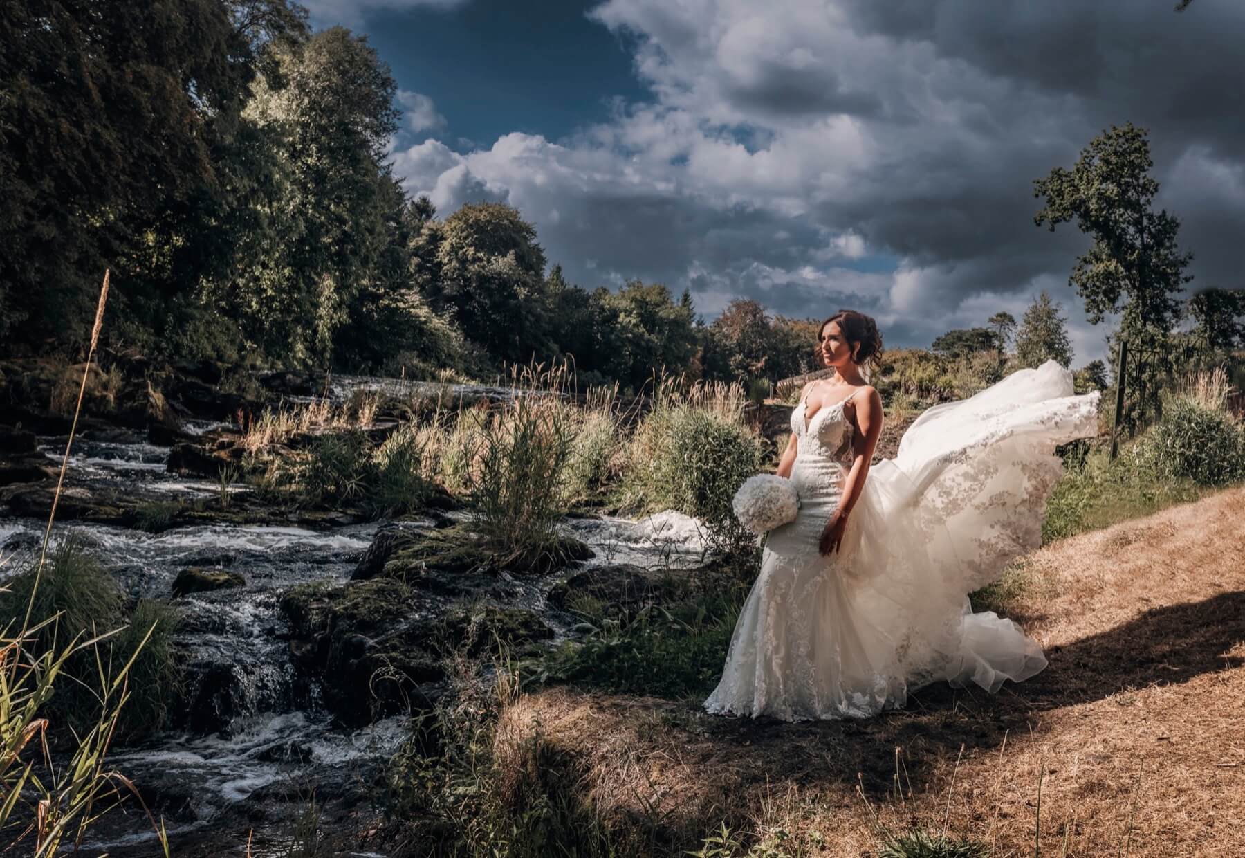 Wedding couple by the River Maine Galgorm Resort