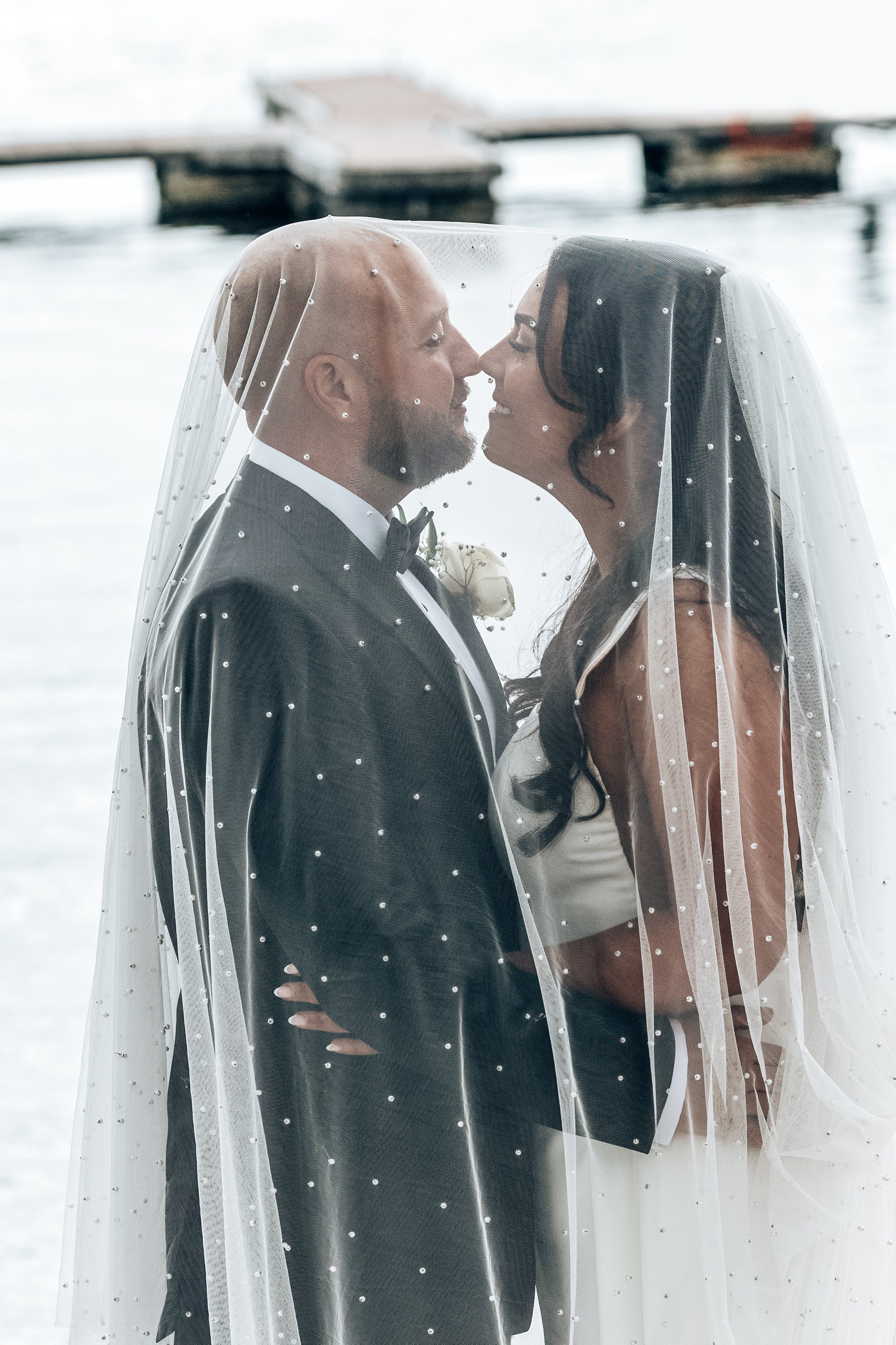 Almost kissing under the veil