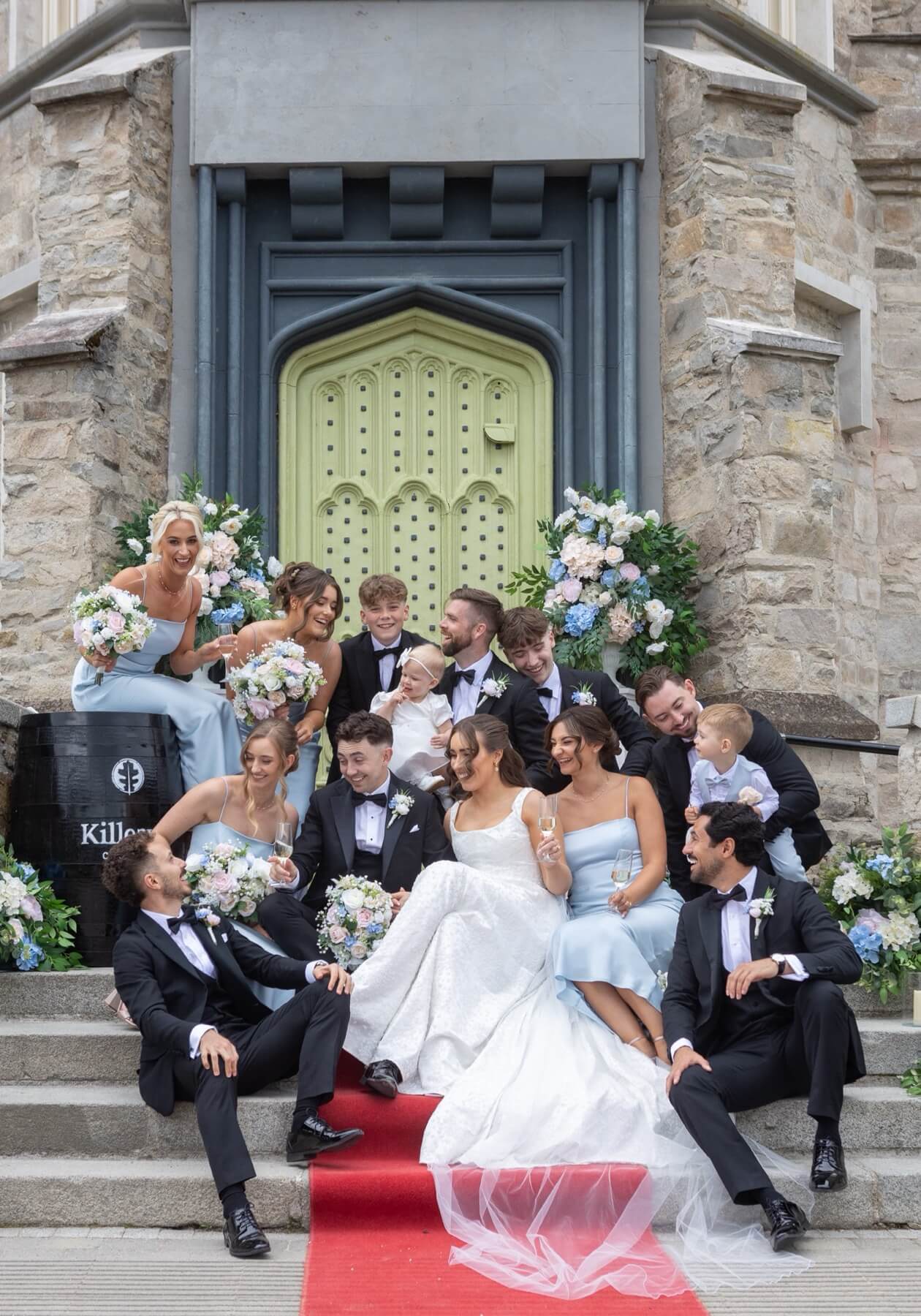 Wedding party on steps of Killeavy Castle