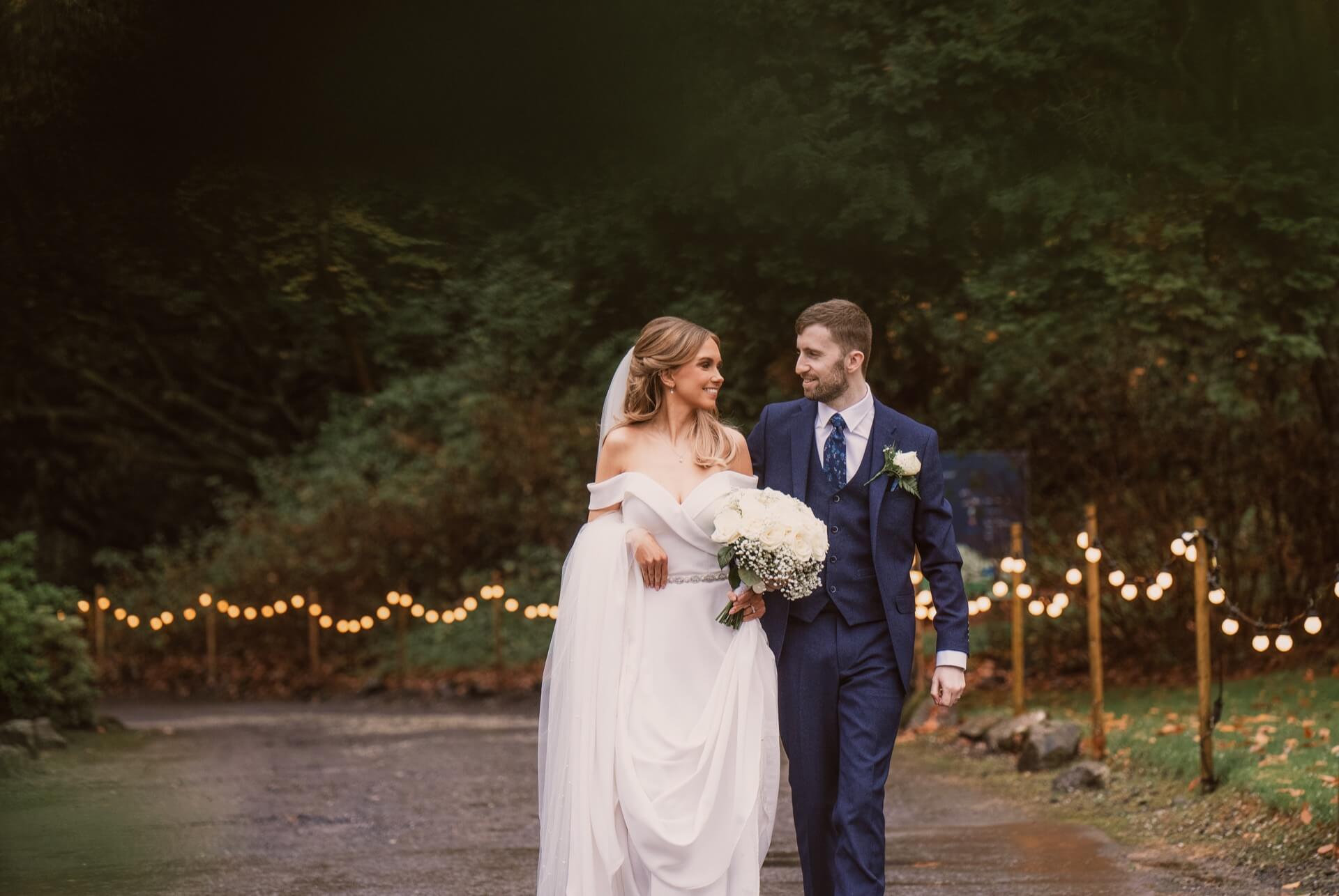 Magheramourne Estate wedding couple festoon lights evening Northern Ireland wedding photography