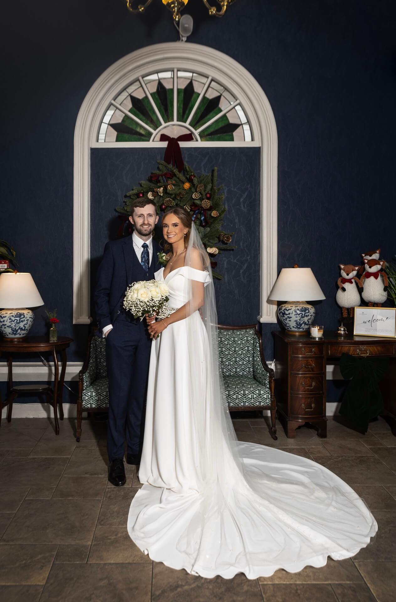 Magheramourne Estate wedding couple navy arched alcove interior Northern Ireland wedding photography
